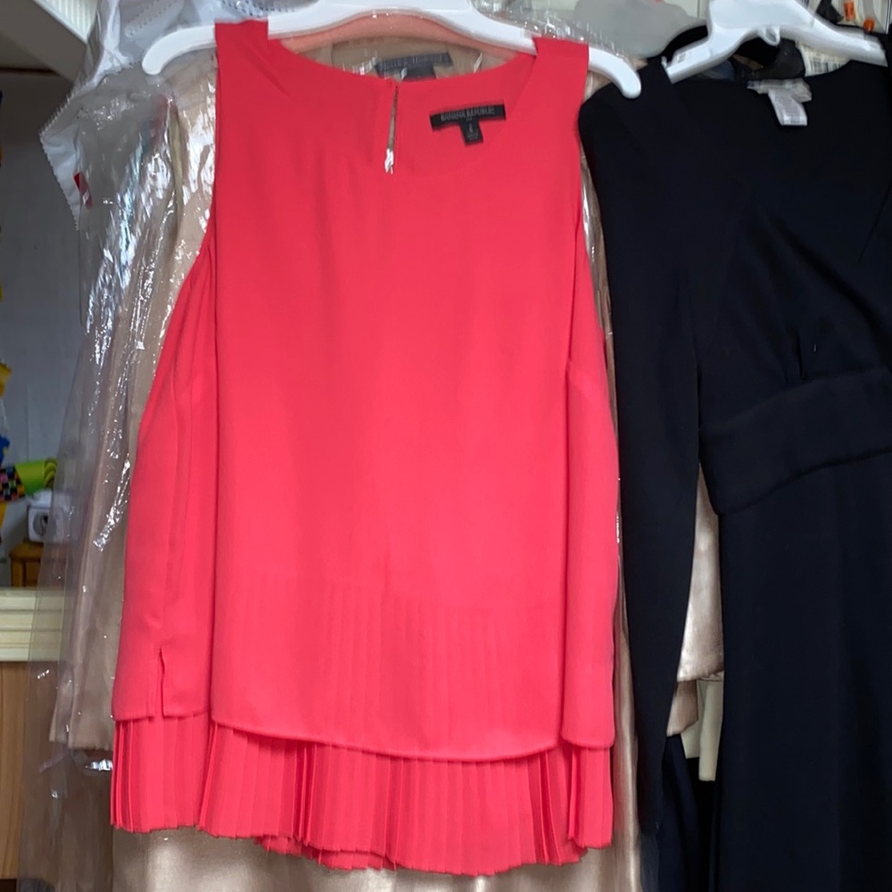 This top can be worn alone or with a sweater or jacket